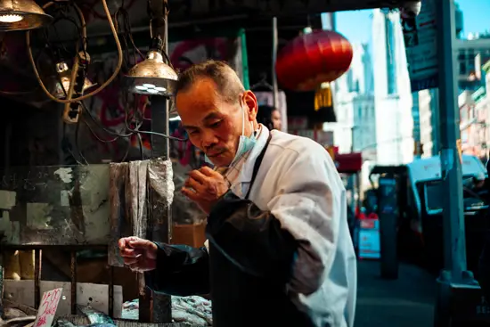 Vendeur à Chinatown / New York, USA (2022)